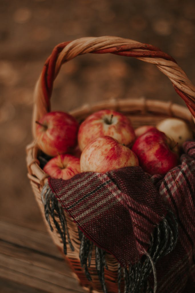 A Selective Focus on Apples in a Basket 